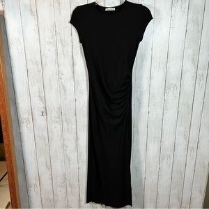 Reformation women’s size small long black dress. Short sleeves